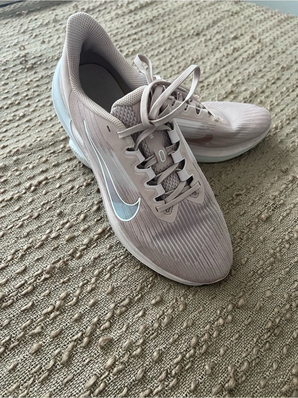 Nike Women's Athletic Running Shoes in Pale Pink with White Swoosh